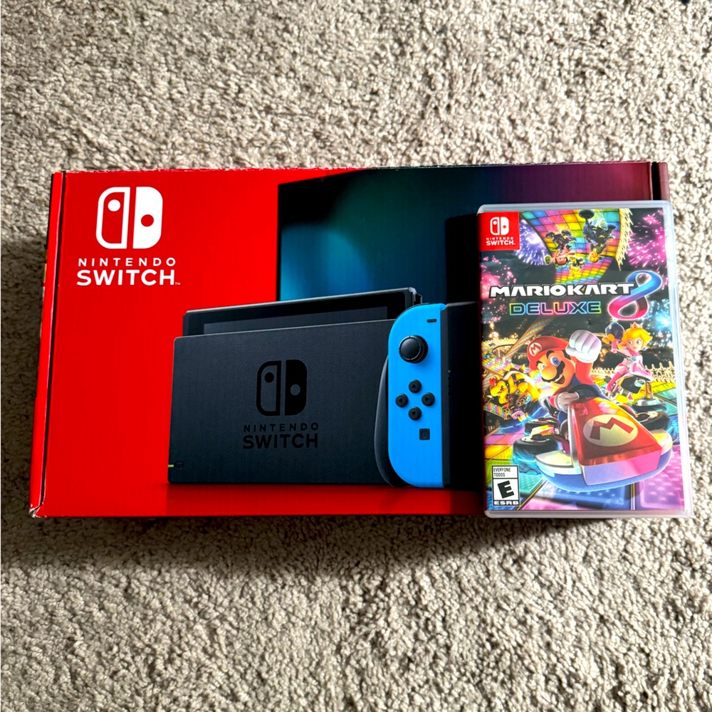 Nintendo Switch + Mario Cart Game